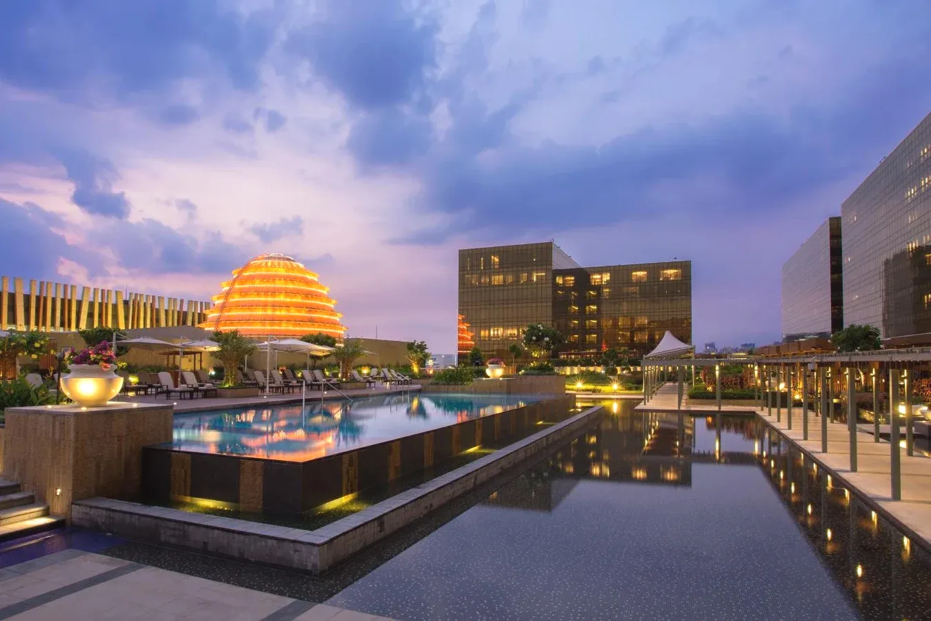 Swimming pool and evening lights World-Class 5-Star Hotel City of Dreams - Nobu Manila in Paranaque